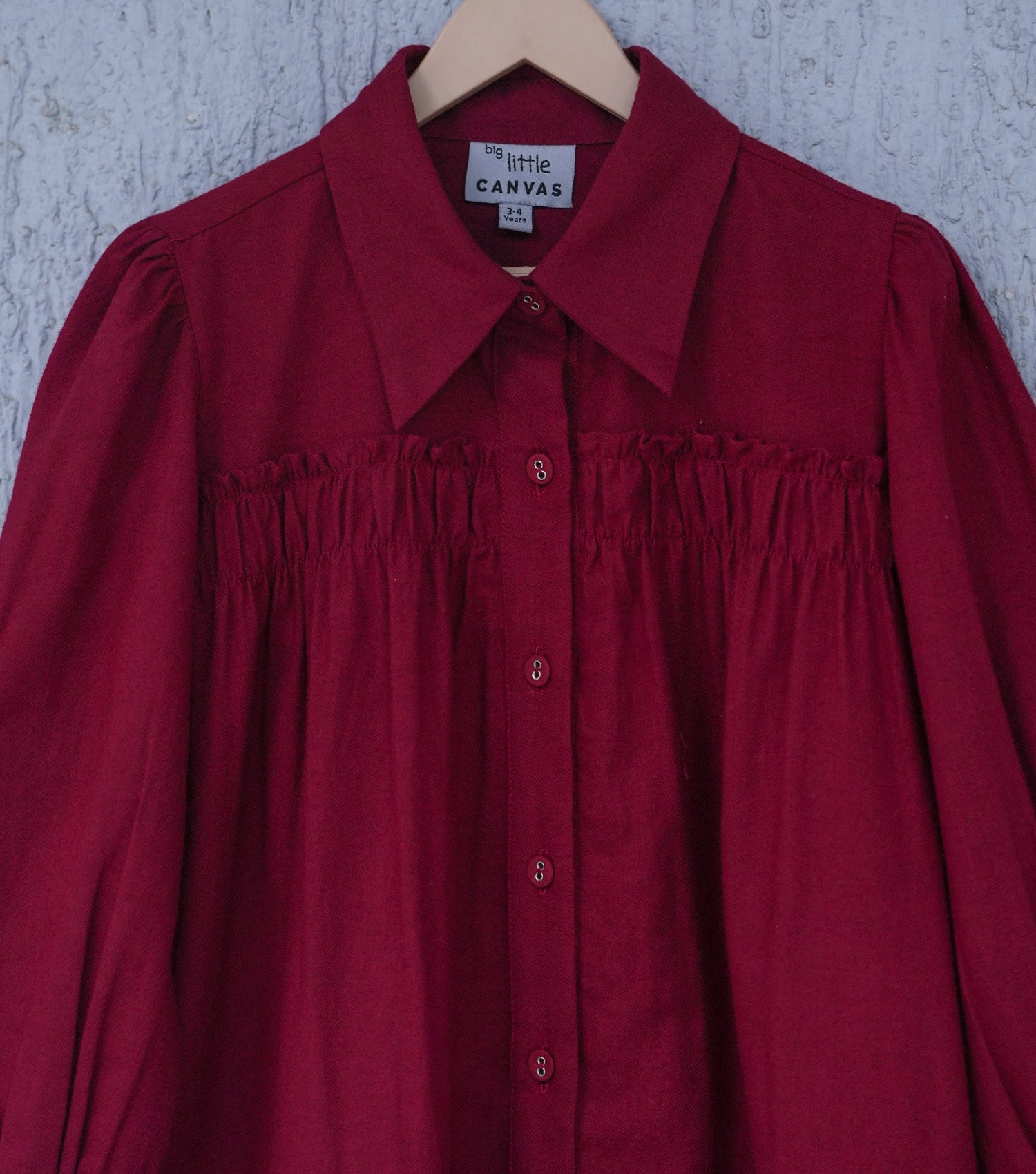 Maroon Woollen Dress for Girls with Smocking Detailing