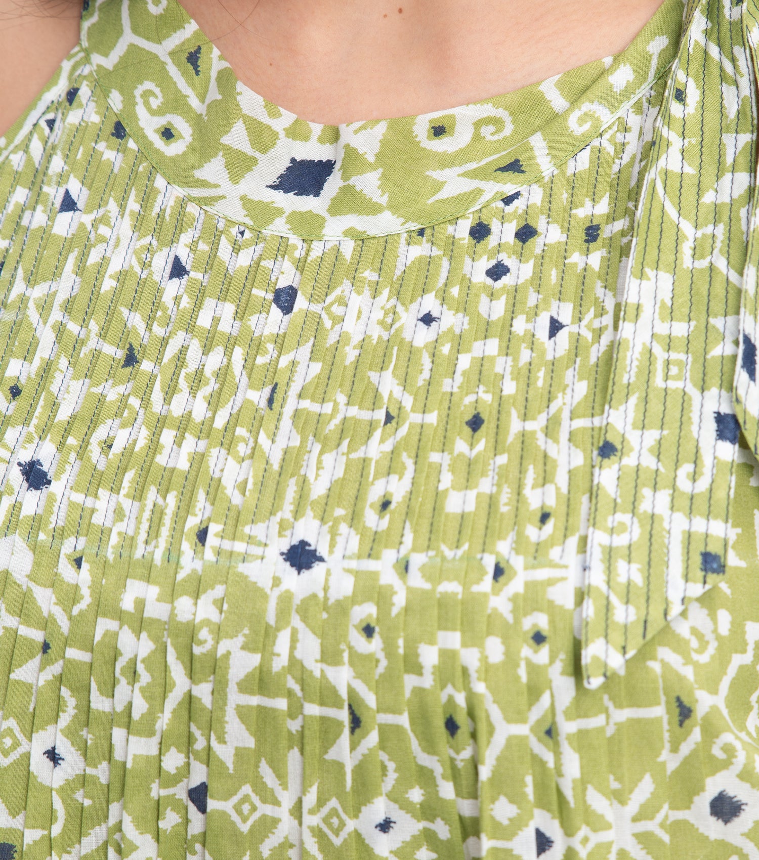 Green Cotton Printed Top with Pintucks & Halter Neck