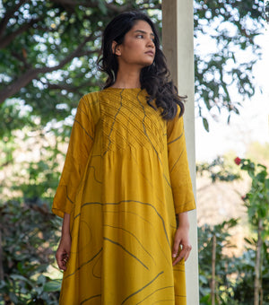 GOLDEN BLOOM MUSLIN PRINTED MAXI DRESS