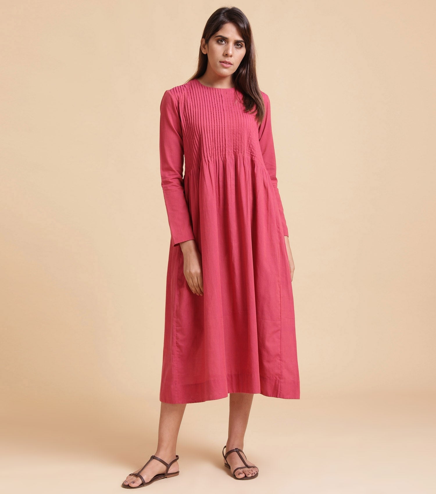 Pink pleated cotton dress