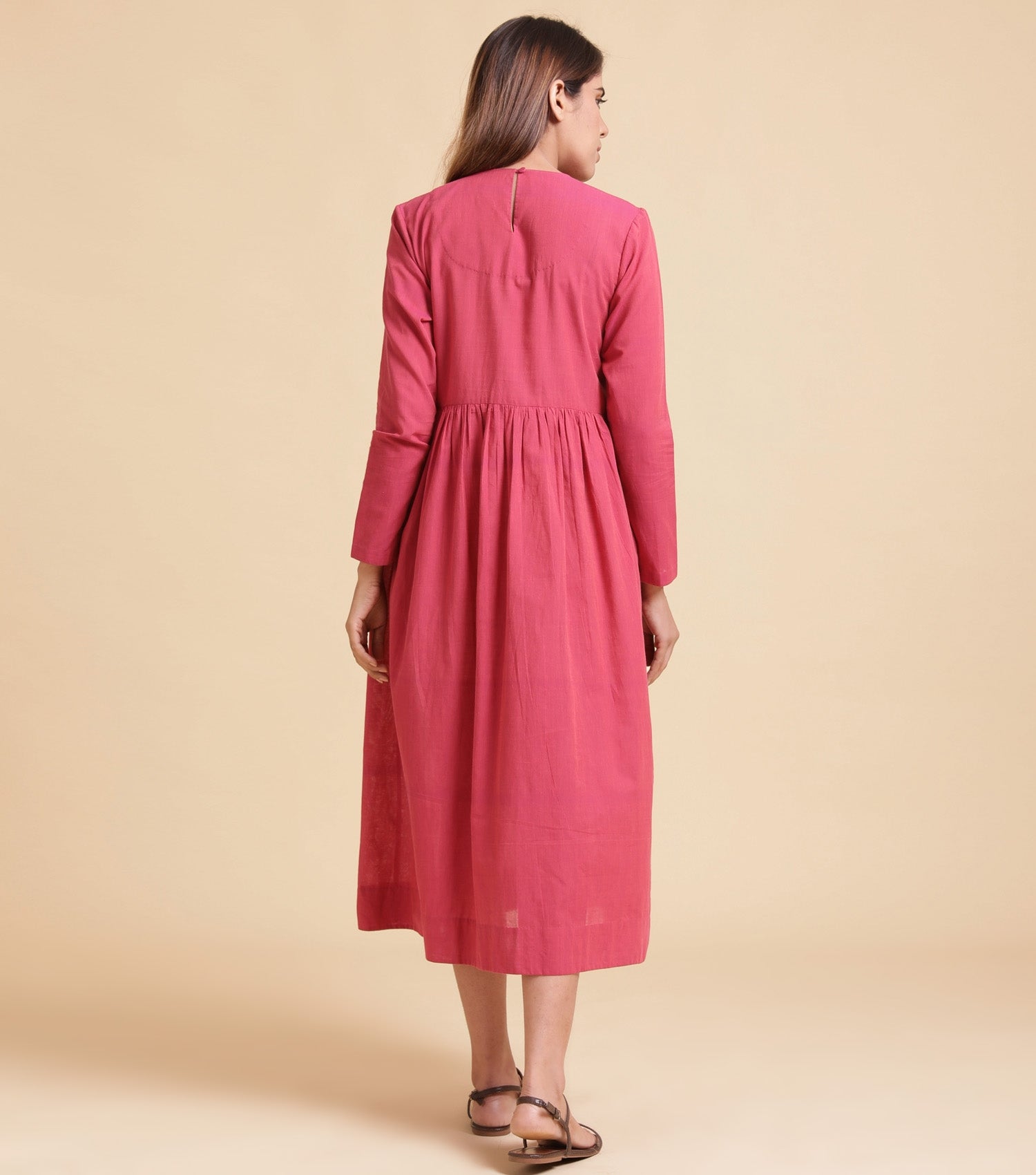 Pink pleated cotton dress